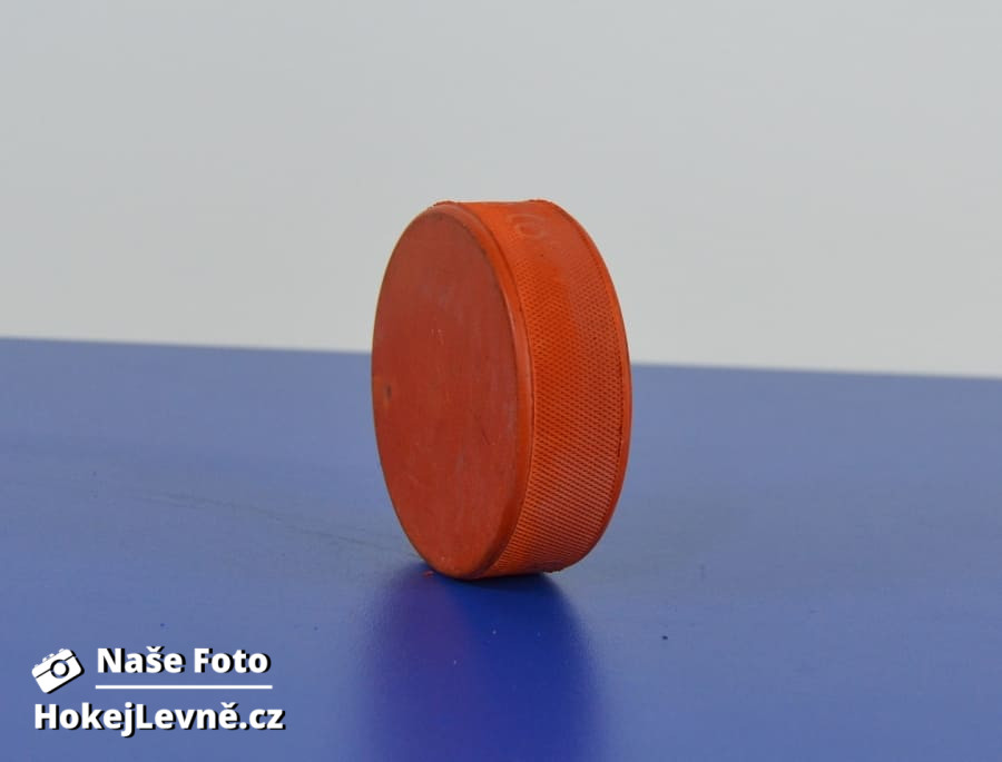 Hokejový puk oranžový těžký 2.jakost